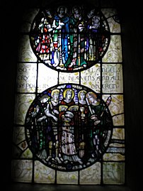 First stained glass window from the entrance on the north side of the church.