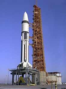 A rocket sits on a launchpad
