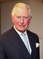 O Rei (Carlos III, n. 1948) Reinando desde 2022