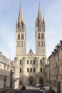 Saint-Étienne, Abbaye aux Hommes, Caen, France, 11th century, with its tall towers, three portals and neat definition of architectural forms became a model for the façades of many later cathedrals across Europe. 14th-century spires