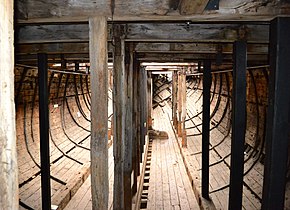 Interior of a wooden ship, viewed end-to-end