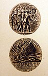 Original Goetz propaganda medal. Lusitania is shown with exaggerated armaments, including aircraft and cannon on board. The wrong date of "5 Mai" is given.