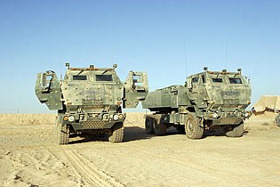 Two Lockheed Martin/BAE Systems M1140 High Mobility Artillery Rocket System (HIMARS) of the U.S. Marines