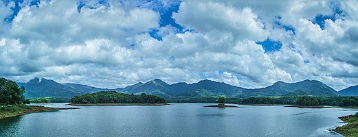 A panoramic view of Western Ghats mountain ranges from Mangalam Dam Reservoir