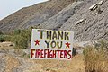 A sign thanking firefighters.