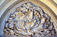 Ex Nihilo (Out of Nothing) by Frederick Hart, tympanum over center doors, Washington National Cathedral, US