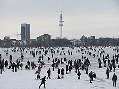 View over frozen Alster towards Radisson Hotel and Hertz-Turm