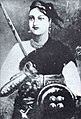 1857 के विद्रोह की एक मुख्य नेत्री झांसी की रानी लक्ष्मीबाई, उन्होंने इससे पहले लॉर्ड डलहौजी के विलय के सिद्धान्त के परिणामस्वरूप अपना राज्य खो दिया।