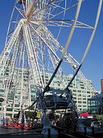 Four-car 30 m tall drive-in Ferris wheel at Harbourfront, Toronto, Canada, in 2004[181]