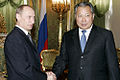 Russian President Vladimir Putin and former Kyrgyz President Kurmanbek Bakiyev.