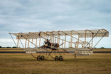 Photograph of a wooden biplane