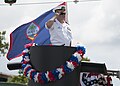 The commander of Submarine Squadron 15 at Naval Base Guam on a float in the 2019 Liberation Day parade
