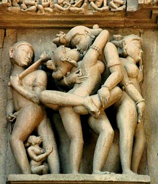 An erotic sculpture from a temple at Khajuraho, India, 10th century A.D.