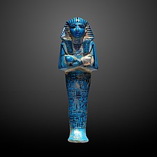 Figure of a servant from the tomb of King Seth I (1244–1279 BC). The figure is made of faience with a blue glaze, designed to resemble turquoise.