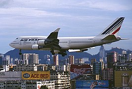 An Air France Boeing 747 passing above Kowloon, prior to landing at the old airport in 1998.