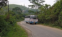 Small bus on a narrow road