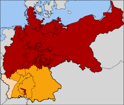 The North German Confederation (red). The southern German states that joined in 1870 to form the German Empire are in orange. Alsace–Lorraine, the territory annexed following the Franco-Prussian War of 1870, is in tan. The red territory in the south marks the original princedom of the House of Hohenzollern, rulers of the Kingdom of Prussia.