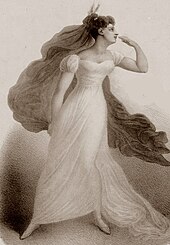 young white woman in Shakespearean costume, with flowing gown and enormous, flowing kerchief, gazing to her left and striking a romantic pose