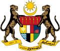 Malezya Federasyonu'nun 1948-1963 yılları arasında kullandığı devlet arması (armada Birlikten güç doğar yazıyor)
