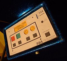 Control panel of arcade machine, with several recessed buttons