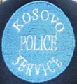 First cap badge of the Kosovo Police Service