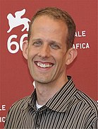 A picture of Pete Docter smiling towards the camera
