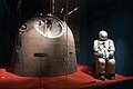 Shenzhou-5 return capsule and space suit displayed at the National Museum of China.