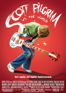 A young blond man emphatically plays bass guitar over a red background, with the film title logo in white above, and slogan in white text followed by credits below