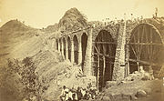 Photograph (1855) showing the construction of the Bhor Ghaut incline bridge, Bombay; the incline was conceived by George Clark, the Chief Engineer in the East India Company's Government of Bombay.