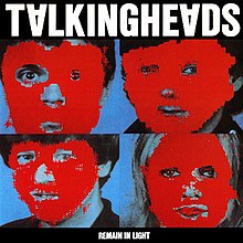 Album cover containing four portraits covered by red blocks of colour, captioned "TALKING HEADS" (with inverted "A"s) at the top and (much smaller) "REMAIN IN LIGHT" at the bottom.