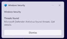 Screenshot of Windows Defender notification toast in Windows 8, reporting taking action to clean detected malware.