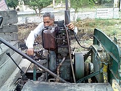 Jugaad engine being hand-started