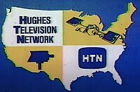 An outline map of the continental United States on a blue background is divided into four quadrants with blue text and illustrations. An image of a satellite fills the northeast quadrant, while a television camera outline fills the southwest quadrant, both on yellow backgrounds. The words "'HUGHES TELEVISION NETWORK" fill the northwest quadrant, and a television screen outline with the "HTN" initials within are in the southeast quadrant, both on white backgrounds.
