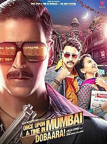 The bust of the title character, Shoaib Khan Akshay Kumar) wearing black full frame sunglasses consisting of the reflection from streetlights dotting the coast line of the city and a black suit and a purple and violet striped shirt underneath holding a gun in his hand occupies a significant portion of the poster, mostly left and lower-front. In this case, the city being Mumbai, or Bombay as it was known in the period in which the film is set in. The other male lead of the film is facing front wearing a denim jacket, saffron shirt and stylised sunglasses holding his shirt-collar up with a woman breaking into laughter resting on his chest looking upwards. The backdrop consists of verandahs of chawls of Mumbai and a waxing crescent moon in the sky. The title logo of the film and credits below.