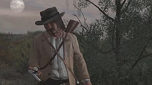 The second player character, dressed as an outlaw, looks mournfully at his gun.