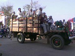 Jugaad vehicle carrying passengers to a political rally in Agra, India