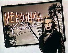 The words "Veronica Clare" are shown in two fonts on a postcard-style image of a cityscape with a black-and-white image of a woman in front of it.