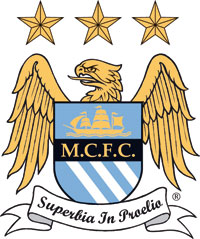 A crest depicting a shield with a eagle behind it. ON the shield is a picture of a ship, the initials M.C.F.C. and three diagonal stripes. Below the shield is a ribbon with the sesanti "Superbia in Proelia". Above the eagle are three stars.